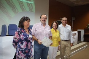 Joaquín Toro, segundo por la izquierda, recoge el galardón a la mejor comunicación oral.
